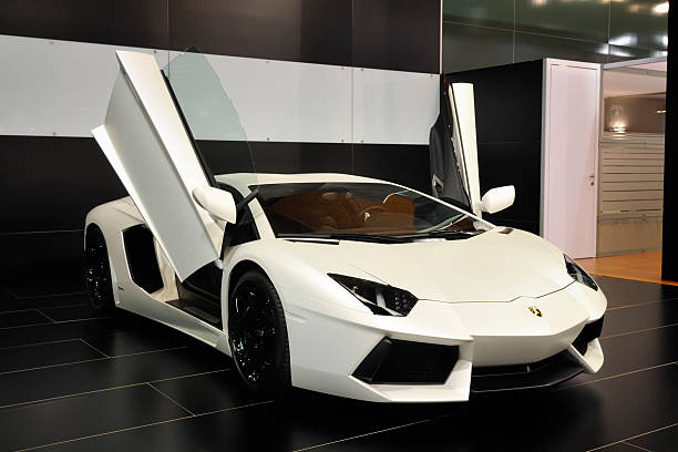 Brussels, Belgium - January 10, 2012: White Lamborghini Aventador LP700-4 on display during the 2012 Brussels motor show.